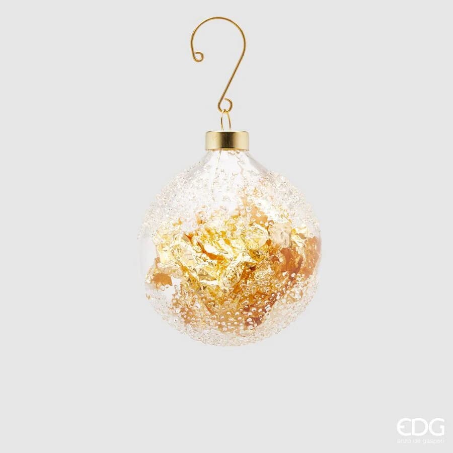 Pallina di Natale in vetro con foglia oro firmata EDG: elegante, luminosa e raffinata. Perfetta per decorazioni natalizie di grande impatto visivo.