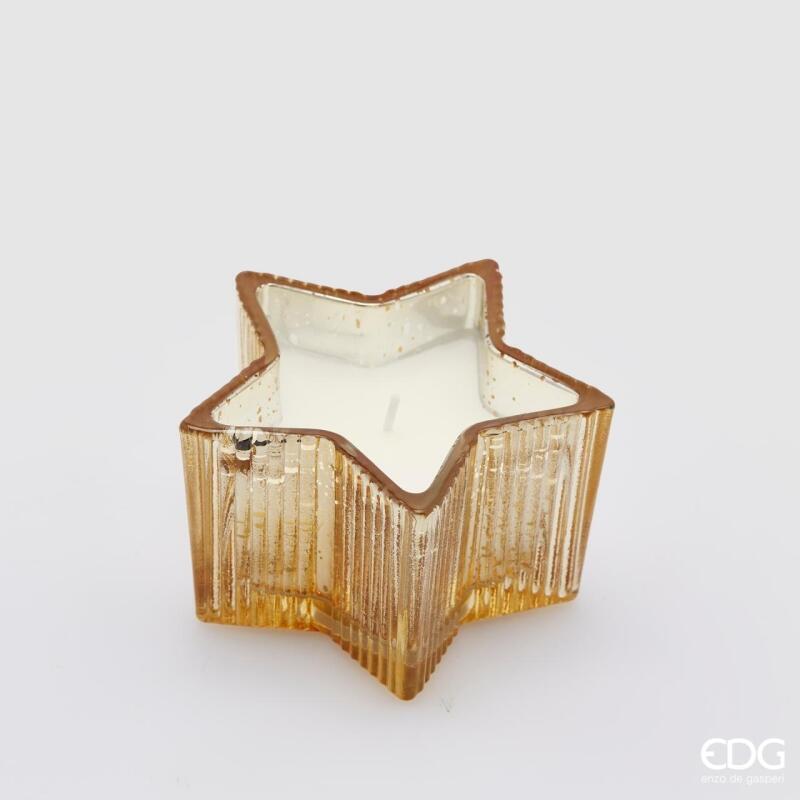 Candela a stella oro EDG in vetro lavorato. Perfetta come segnaposto elegante o punto luce per i tuoi addobbi natalizi. Crea subito un'atmosfera magica e calda.