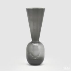 Vaso in vetro biforma grigio EDG: design moderno, vetro fumé e linee eleganti. Perfetto come centrotavola o complemento decorativo contemporaneo.