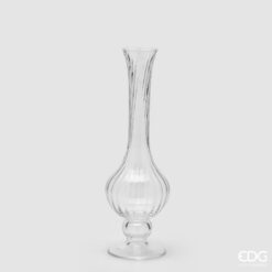 Vaso collolungo in vetro EDG: design slanciato e trasparente con texture verticale, perfetto per decorare ambienti moderni con eleganza e leggerezza.