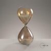 Clessidra decorativa Mascagni H 38 cm in vetro dorato ed ambrato con finitura metallizzata. Imponente scultura da terra e tavolo.